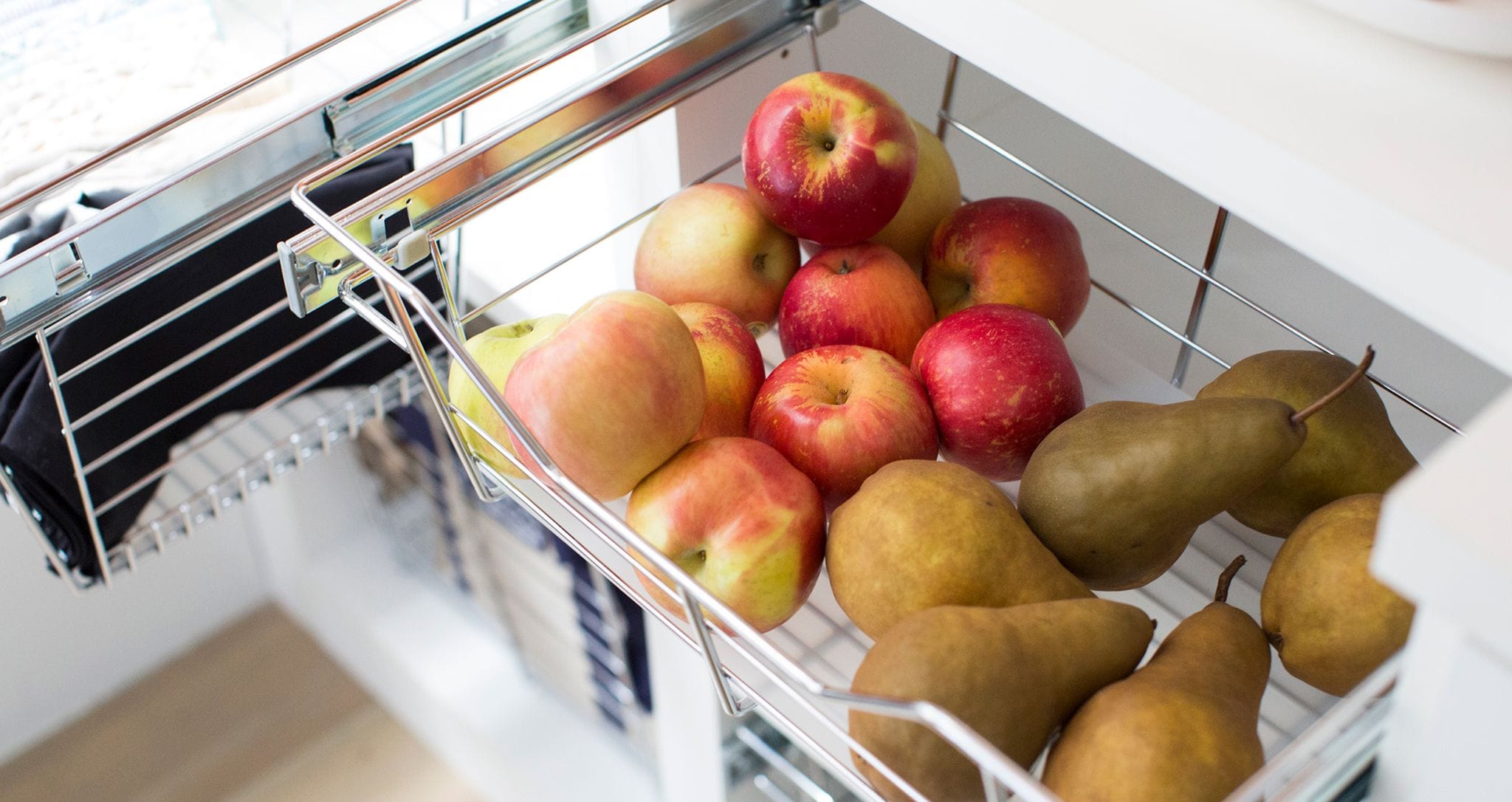Pull out produce storage for a kitchen pantry for Erin Hiemstra's home by California Closets