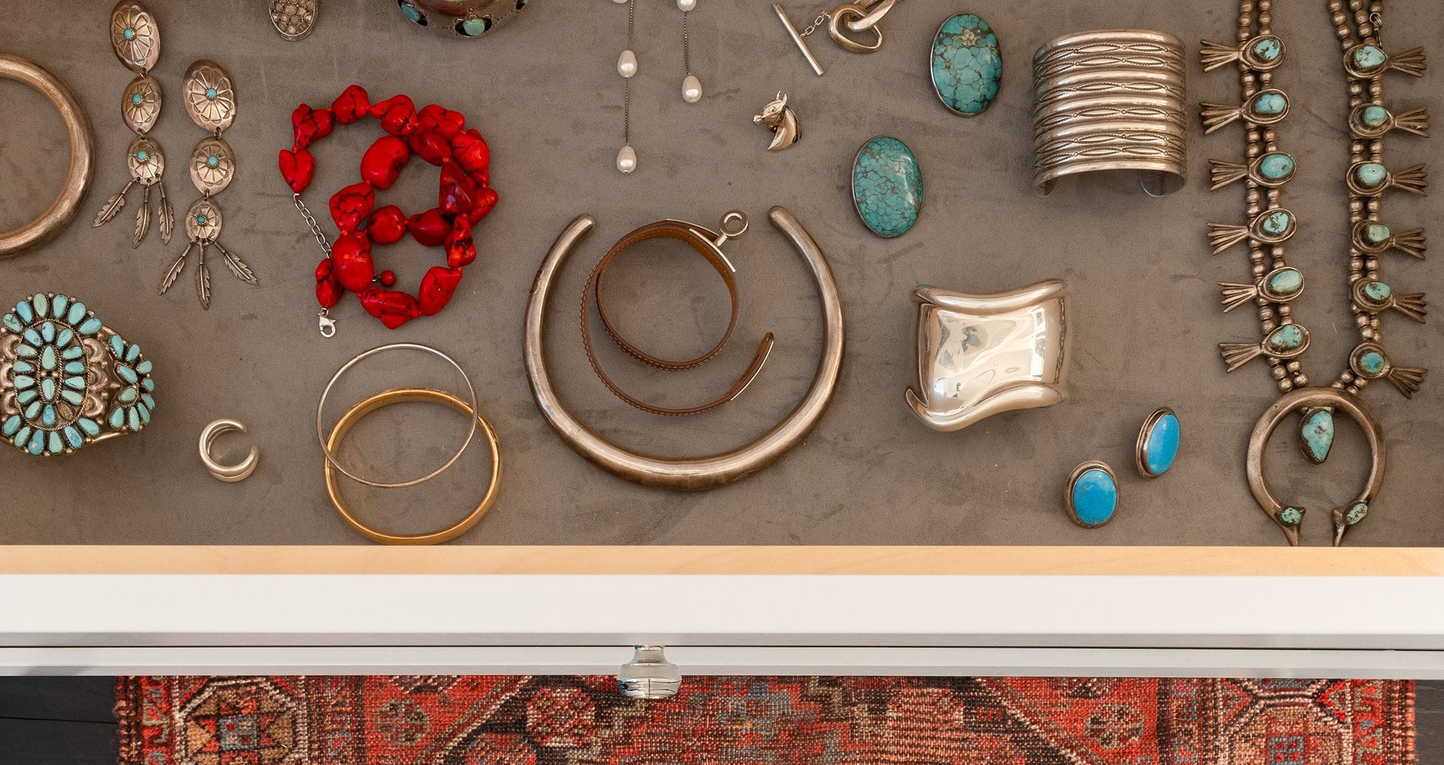 Michelle Adams' customized closet dresser drawers for jewelry with padding by California Closets