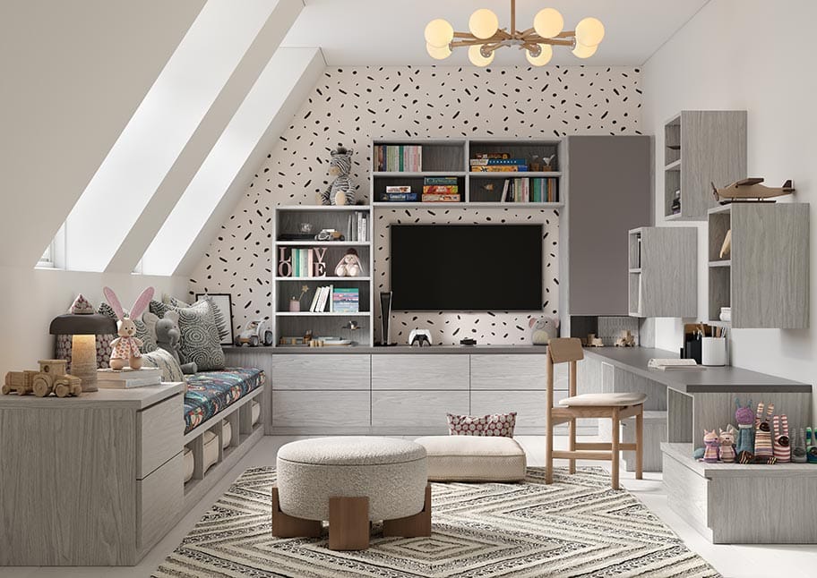 Entertainment center with media in a playroom with custom cabinets by California Closets