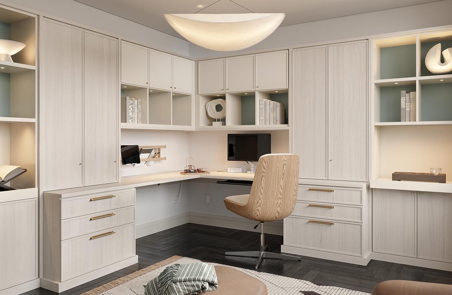 Home office built in with custom cabinets in a light wood finish by California Closets