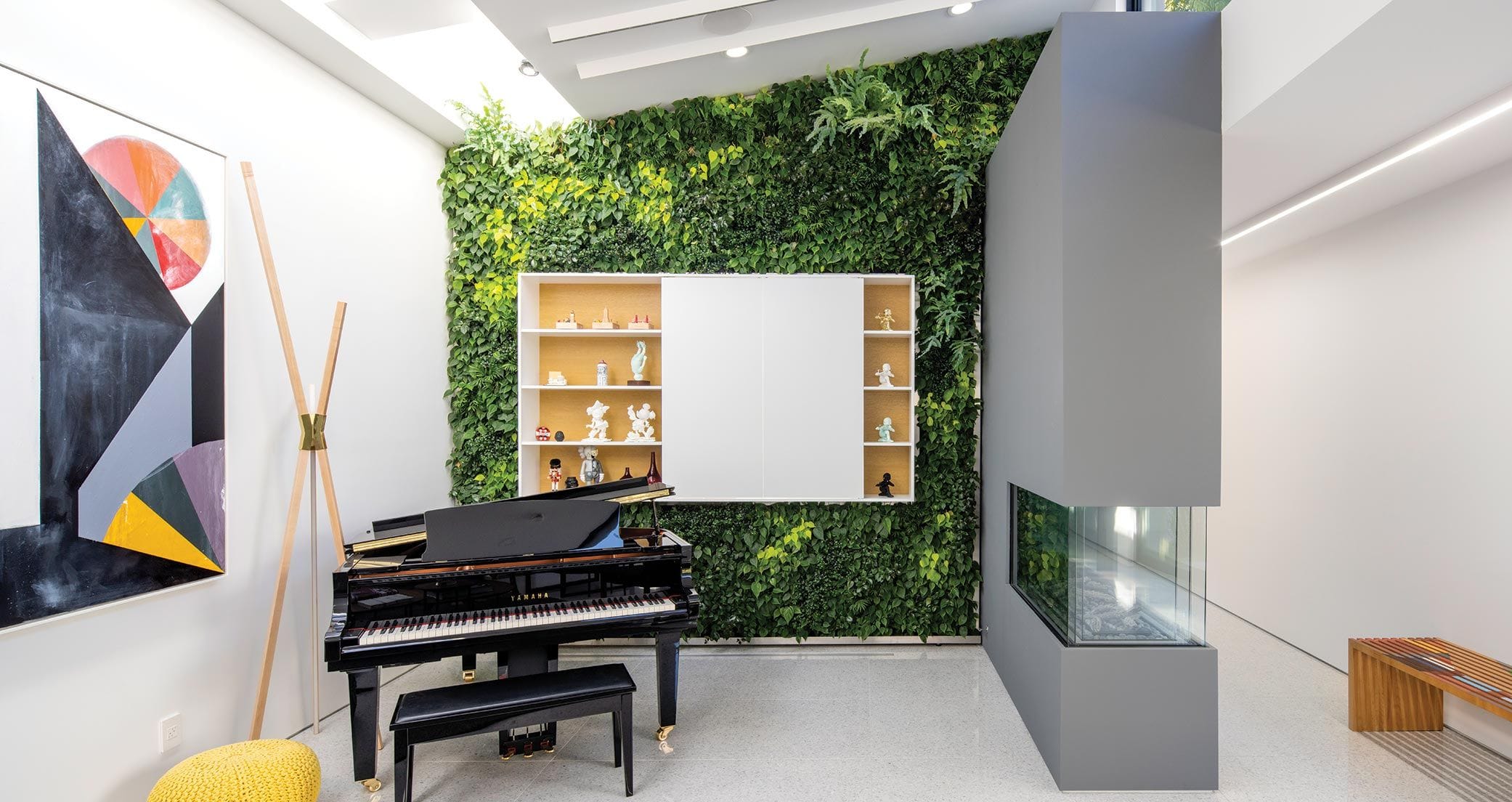 Dan Brunn's piano in a room with a wall made of