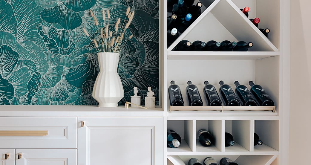Close up of wine bar storage with custom shelving and cabinets from California Closets