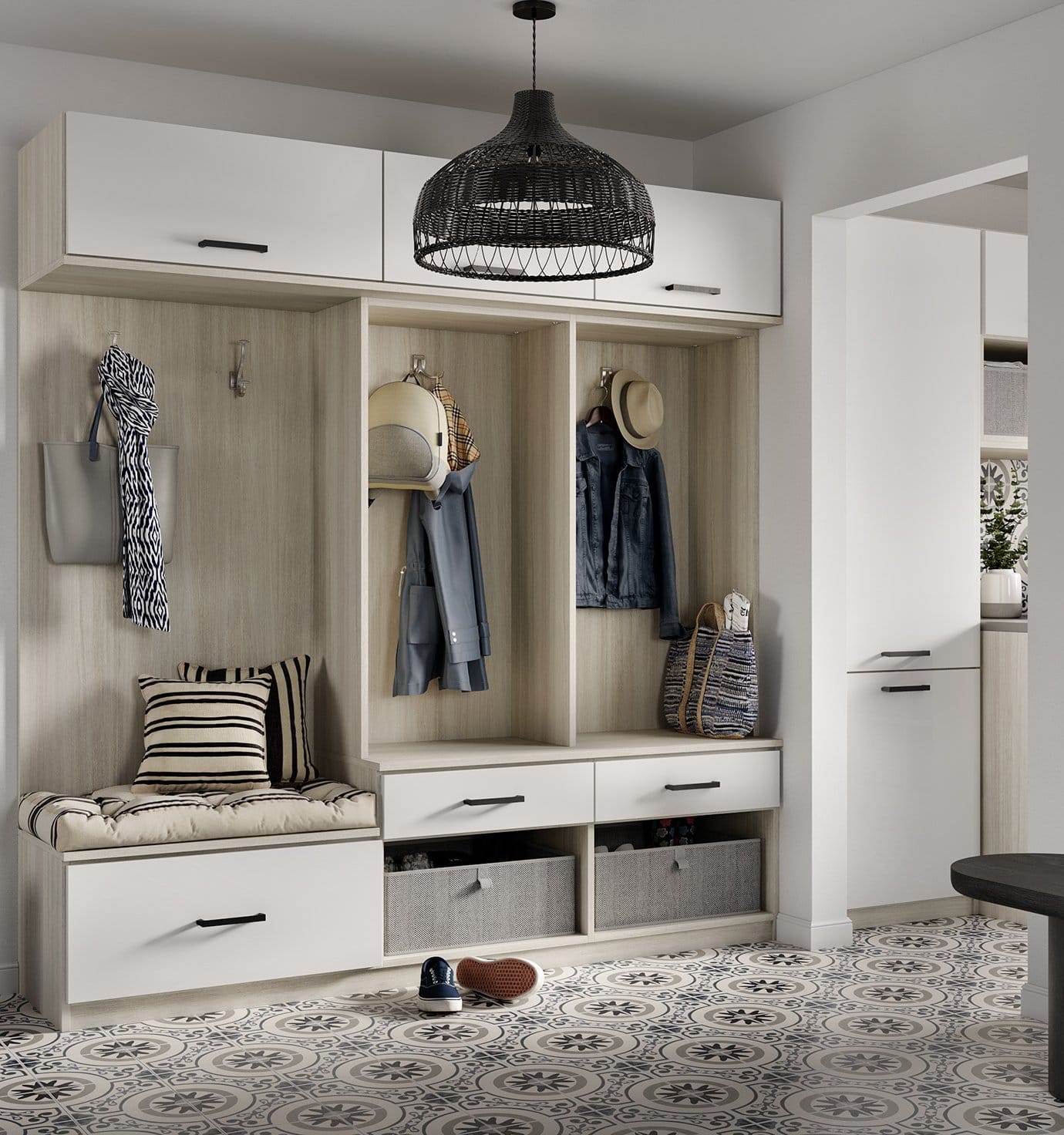 Entryway with mudroom storage drawers by California Closets