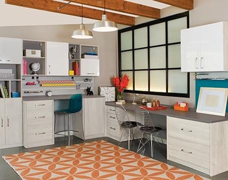 Custom craft storage solution shelving and built in desks by California Closets