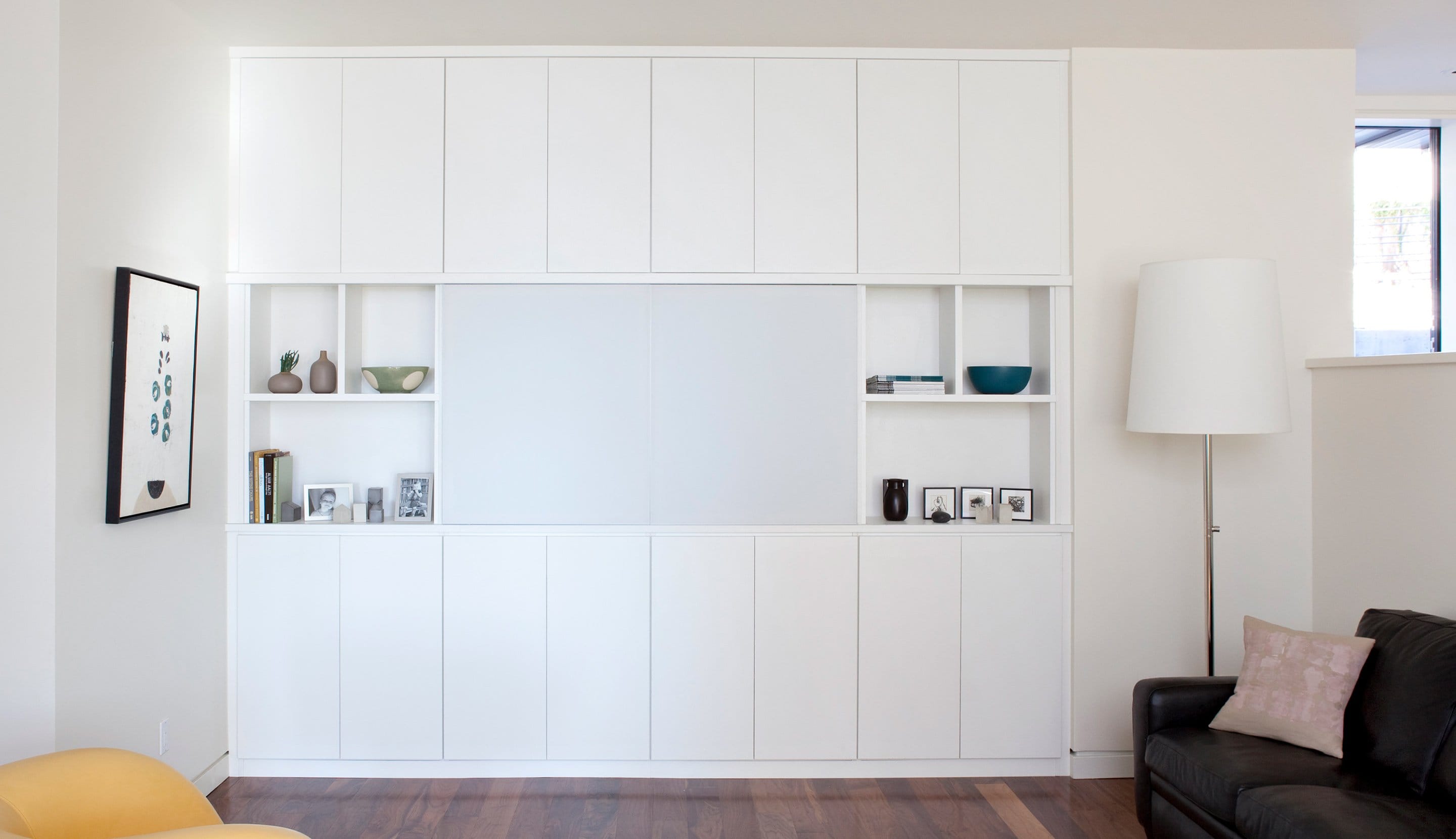Media center installed in white finish by California Closets